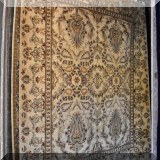 R49. Tiara handknotted 100% wool champagne colored Oriental rug. 8' x 10'3” 